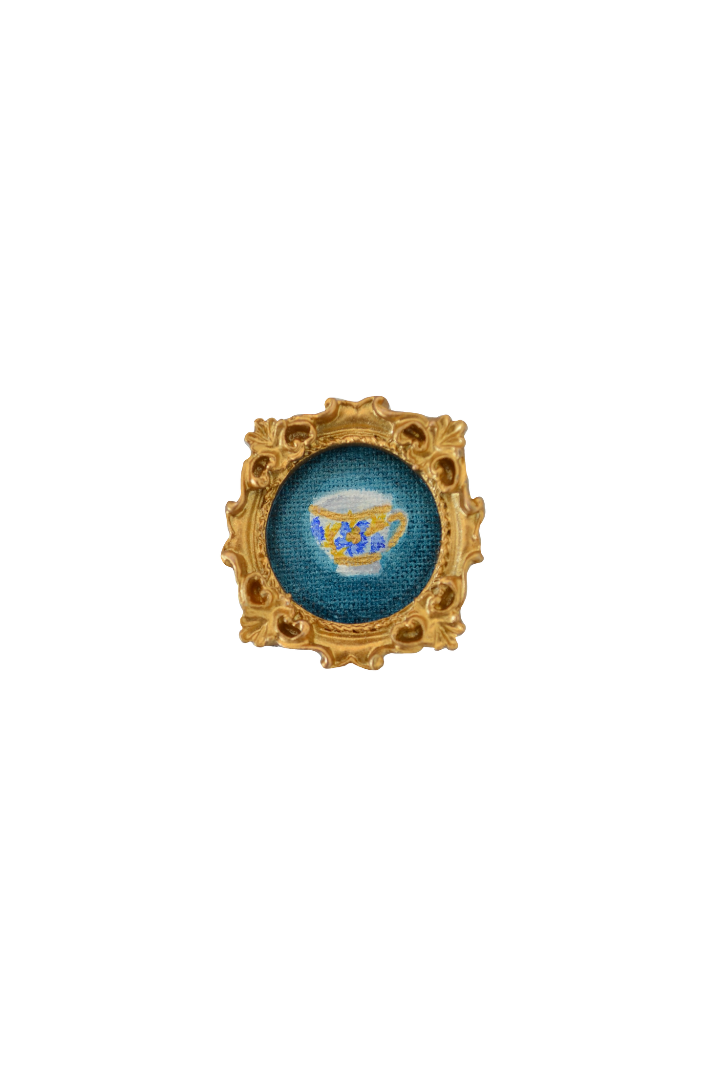 Gold and blue teacup magnet